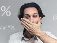 Man with hand over mouth, surrounded by mock swear words